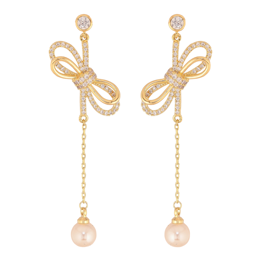 Сережки Xuping колір 14K з кристалами Swarovski пусети "Бантики з кристалами Clear та перлинами" фото №1 Сережки Xuping колір 14K з кристалами Swarovski пусети "Бантики з кристалами Clear та перлинами" фото №1