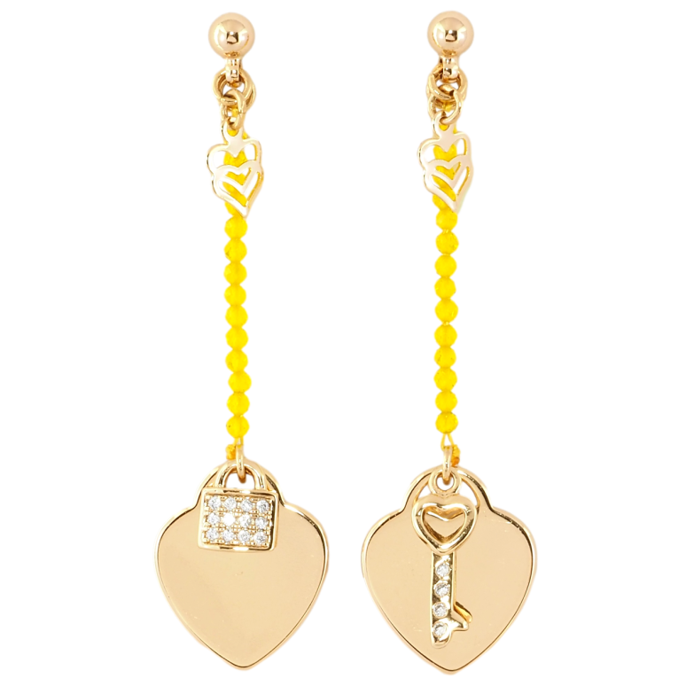 Серьги Xuping Позолота 18K пусеты Сердечки с замочком и ключиком на веревке с желтыми бусинами фото №2 Серьги Xuping Позолота 18K пусеты Сердечки с замочком и ключиком на веревке с желтыми бусинами фото №2