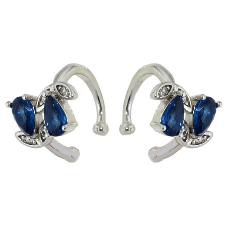 Серьги Xuping Родий каффы Синие кристальные бутоны фото №1 Серьги Xuping Родий каффы Синие кристальные бутоны фото №1