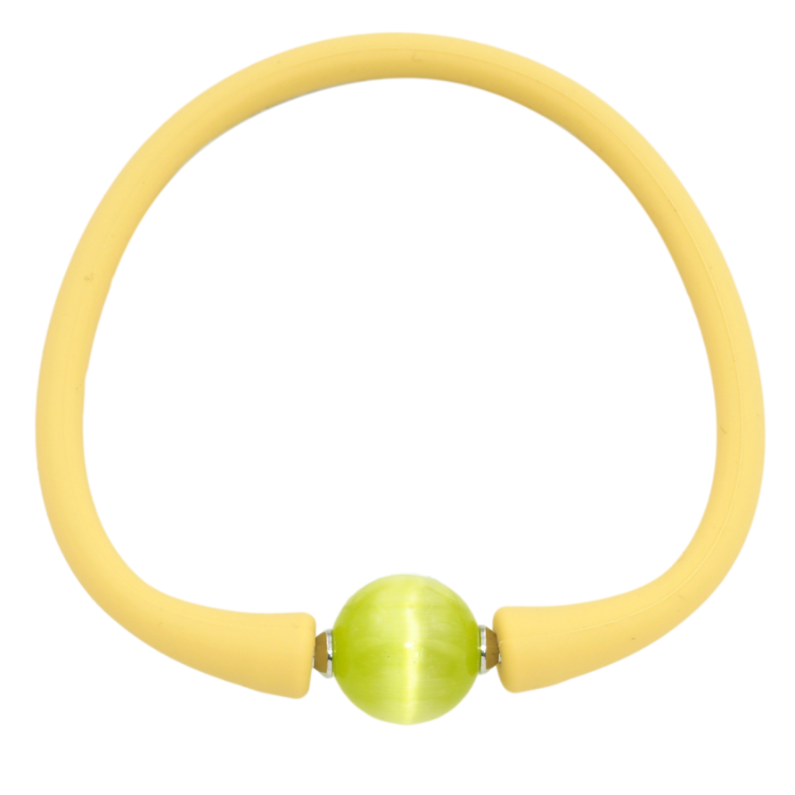 Браслет Xuping Родий Желтый каучуковый шнур с салатовой бусиной размер 17.5см х 4мм; ø 12мм фото №1