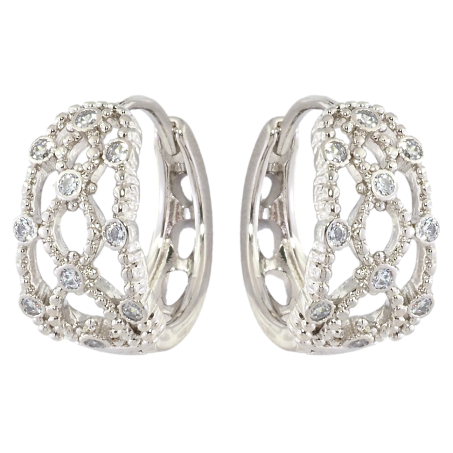 Серьги Xuping Родий колечки Узор с вставками циркония фото №1