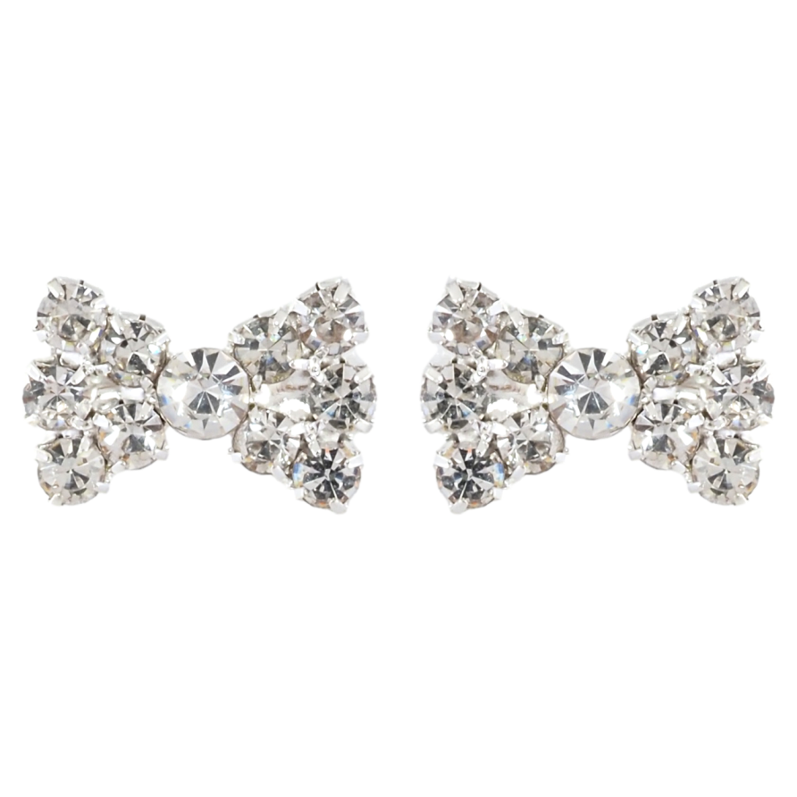 Серьги пусеты Бантики со стразами фото №1 Серьги пусеты Бантики со стразами фото №1